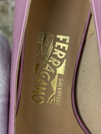 Title: Ferragamo Bow Detail Logo Plaque Patent Pumps